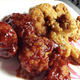 Illustration for article titled Boneless Vs. Bone-In Chicken Wings: The Snacktaku Showdown